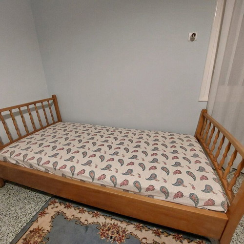 Single solid wood bed used with new mattress