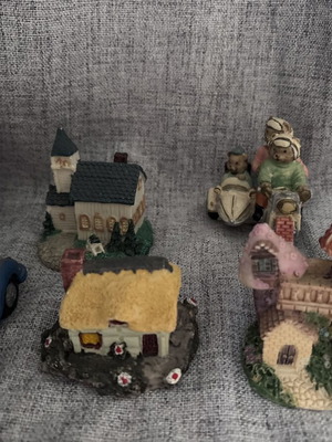 Vintage collection of decorative miniature houses and teddy bear figures