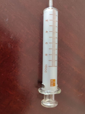 Vintage glass syringe 10cc used, borosilicate