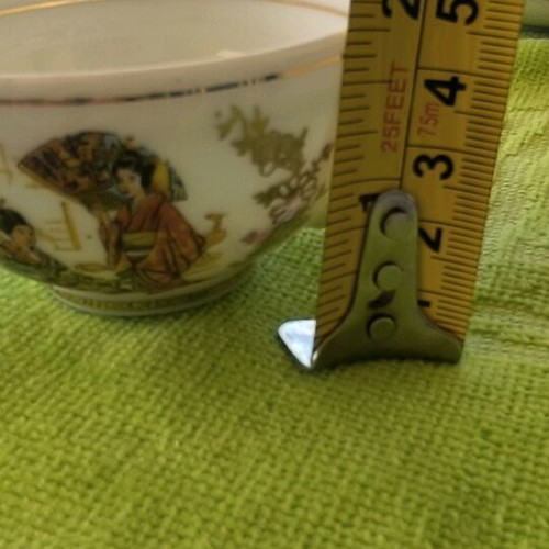 Kutani porcelain decorative cups with lithographs and gold trim used