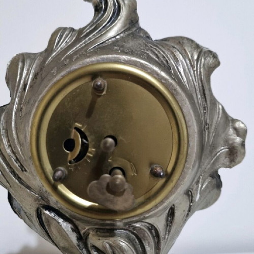 Antique clock used with German mechanism and porcelain decoration