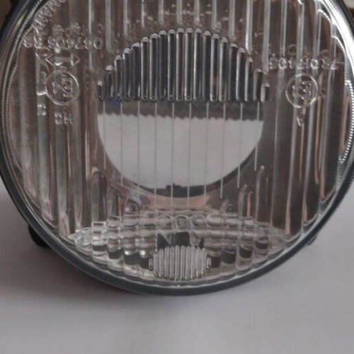 BMW E30 Left Headlight Shell New 63121385633 Hella