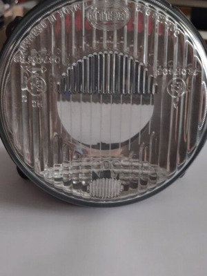 BMW E30 Left Headlight Shell New 63121385633 Hella
