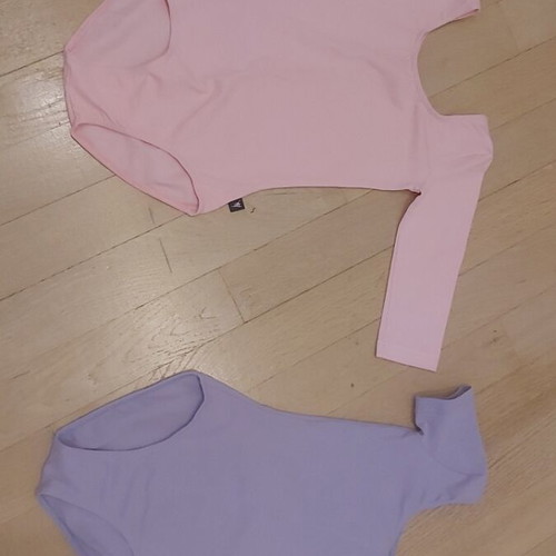 Kids' bodysuits like new, pack of 2, sizes 6-8 years, pink and purple