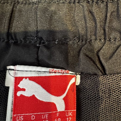 Puma 3/4 black sports pants, size medium