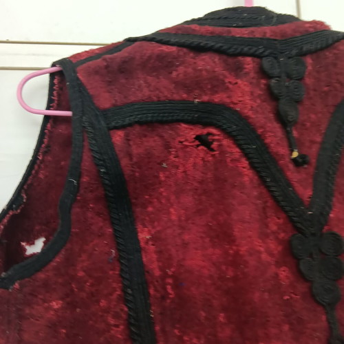 Collectible traditional woolen burgundy vest used