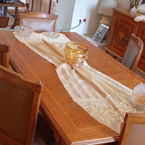 Wooden dining set used with leatherette chairs