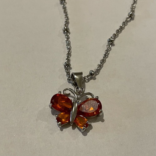 Necklace with orange butterfly pendant like new