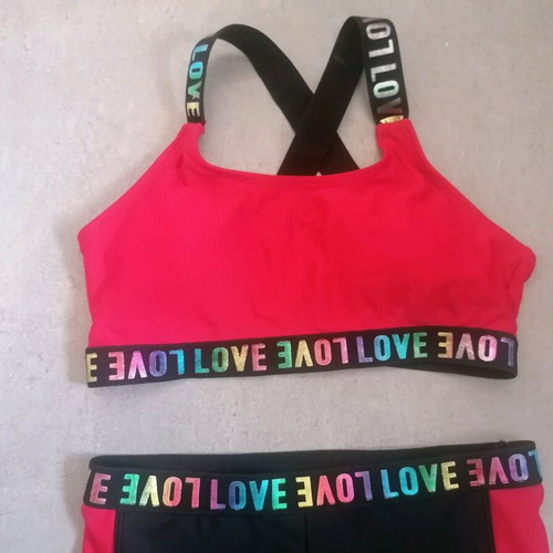 Girls' beach set used, swimsuit with crisscross back and shorts