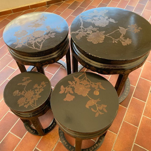 Asian-style nesting vintage coffee tables set used, wood with gold motifs