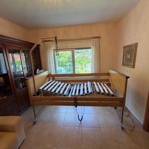 Hospital electric adjustable bed with air mattress, bedside table and wheelchair like new