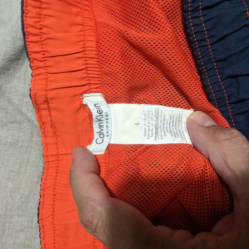 Calvin Klein men's swim shorts like new, blue with orange details, size L