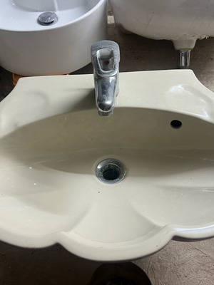 Sink used with faucet included