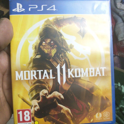 PS4 controller like new with cable and 3 games