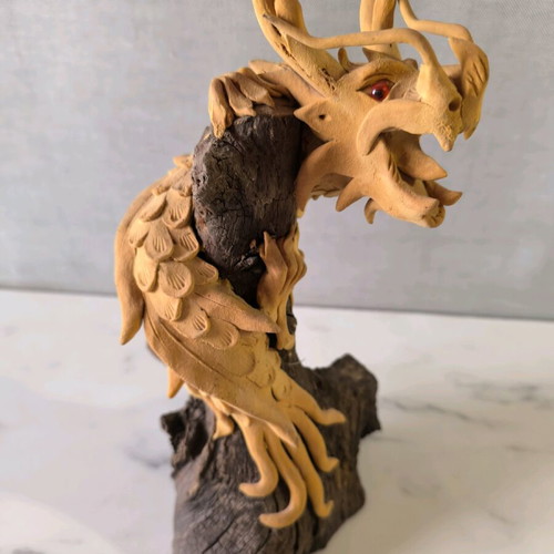 Wooden handmade dragon used with wooden base