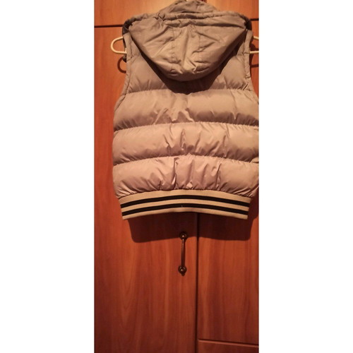 M-ONE sleeveless kids jacket silver like new, size S for 6 years old
