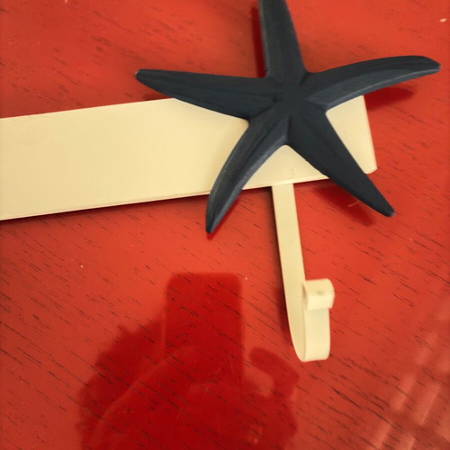 Double wall hook decorated with starfish and real shell