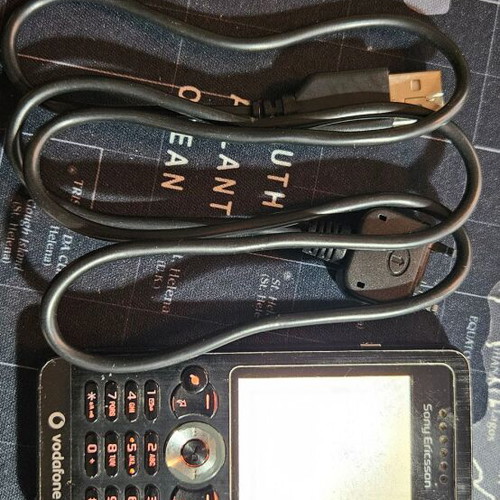 Sony Ericsson W302 Walkman used with USB charging cable