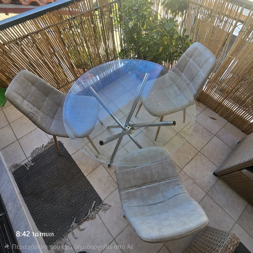 Glass table with three chairs like new