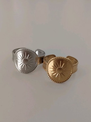 Steel ring set like new, gold and silver with sun engraving