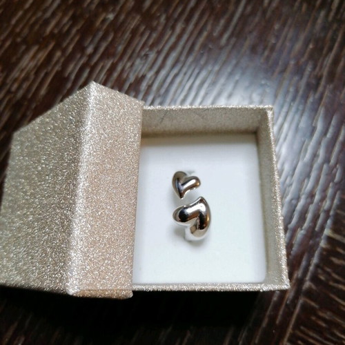 Steel ring with hearts new, silver color