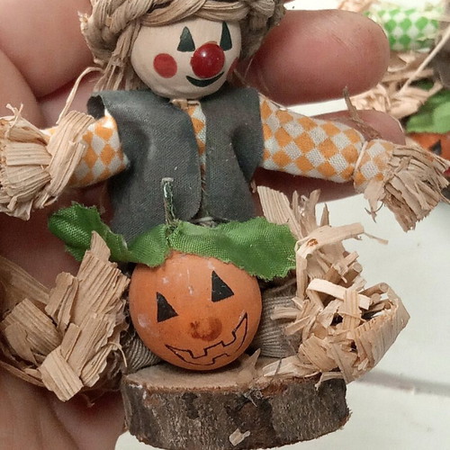 Set of two scarecrow figurines with pumpkin made of natural materials like new