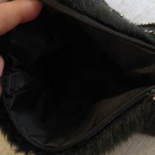 Fur bag like new, black, with zipper and strap with rhinestones