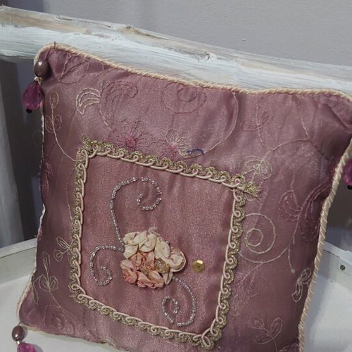 Vintage decorative pillow used with embroidery and embossed flowers