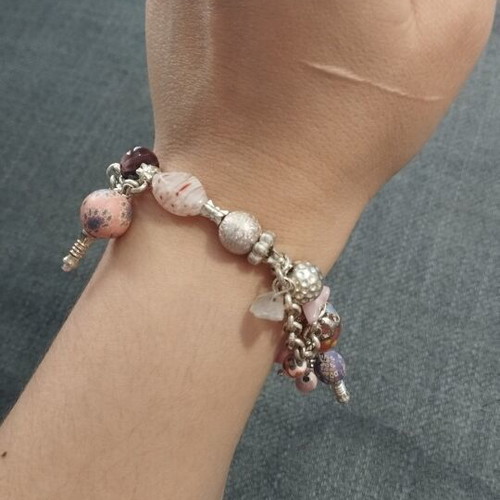 Women's bracelet with charms and pink beads like new