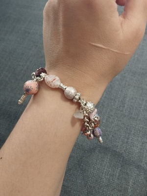 Women's bracelet with charms and pink beads like new