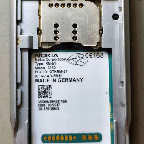 Nokia 3230 RM-51 mobile phone used, non-functional, with charger