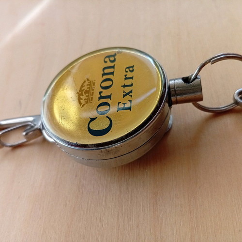 Corona Extra keychain bottle opener used with retractable strap