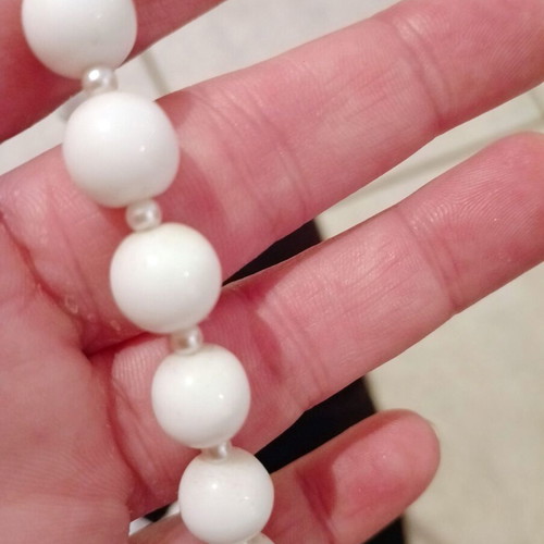 Handmade necklace with white pearls and bone charm used