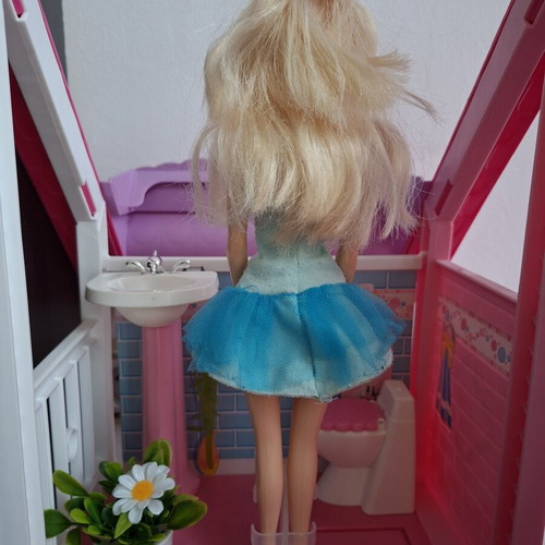 Doll like new with dress wear