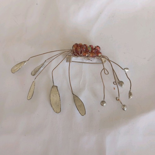 Handmade pin like new, gray, with movable twigs