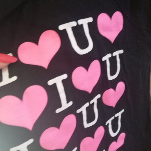 Black short-sleeve top medium with heart print, like new