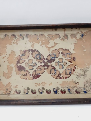 Vintage wooden tray with glass panel and painted design used