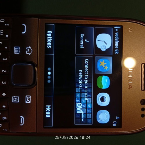 Nokia E6-00 mobile phone, silver, 8 MP camera, Symbian Anna