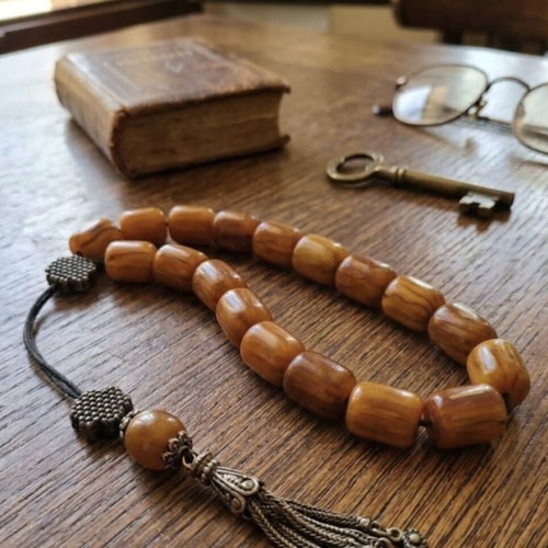 Komboloi with Brown-Honey Beads like new, 17 beads, metal decorations