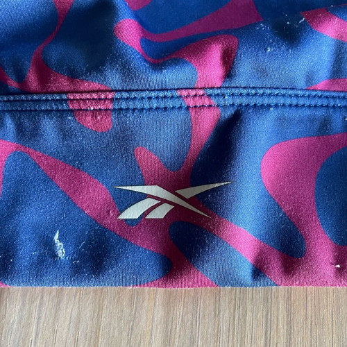 Reebok women's sports bra M used, blue and pink