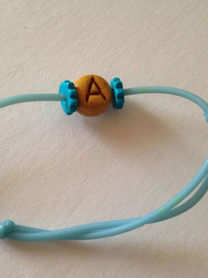 Blue bracelet with bead monogram A used, turquoise and brown