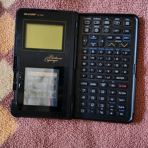 Sharp IQ-7000 electronic organizer used, unknown working condition