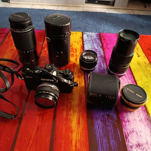 Olympus OM-2S analog camera kit with lenses and Gold Line accessories