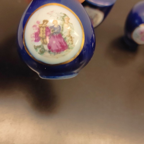 Porcelain decorative small vases like new, set of 5 pieces