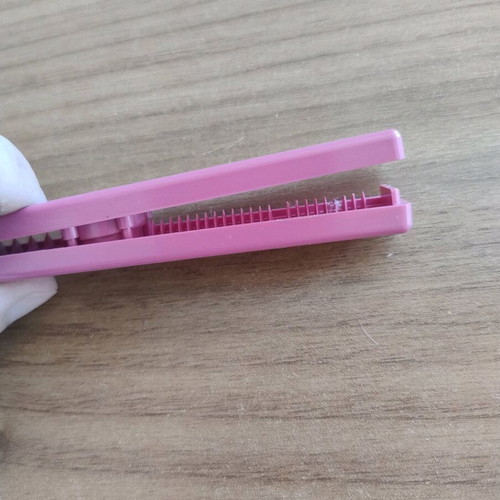 Plastic tool for separating wrapping tape like new, two sizes