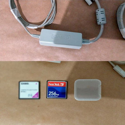Casio QV-3000EX digital camera used with accessories