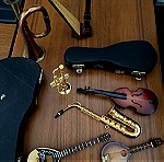  Σετ με 10 μινιατούρες μουσικά όργανα ( ξύλινα και μεταλικα )