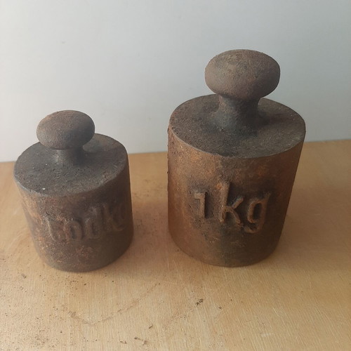 Cast iron weights used, set of 1 kg and 0.5 kg