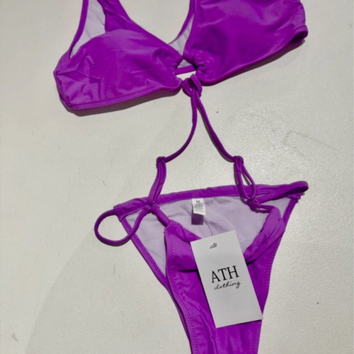 Bikini set new with tags, purple, sizes medium and large