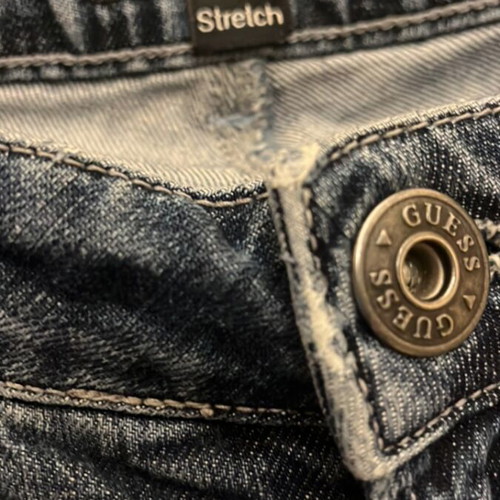 Guess women's jeans used with front rip and pocket designs, size S